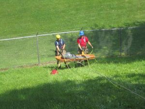 Two Firefighters Training on Carrying a Person