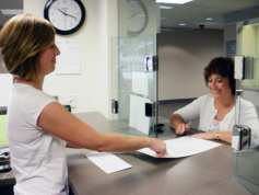 Two Women Looking at a Document